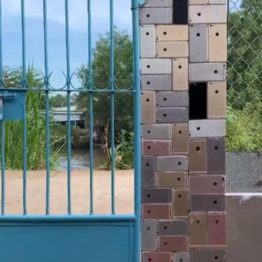 Житель Вьетнама построил забор дома из старых iPhone