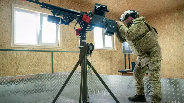 Body armour, VR helmet and machine ...