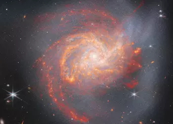 James Webb сделал фото галактики NGC 3256, которая появилась 500 млн лет назад в результате столкновения двух других галактик