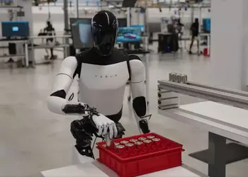 Видео дня: Tesla Optimus делает уборку, готовит еду и выносит мусор