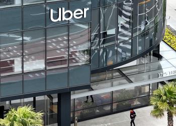 Uber invests $100 million in fintech ...