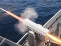 post_big/USS_Green_Bay_conducts_a_live-fire_exercise._29700091152.jpg