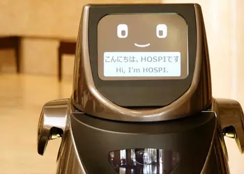 Робот Panasonic Hospi (R) разносит воду и убирает со стола