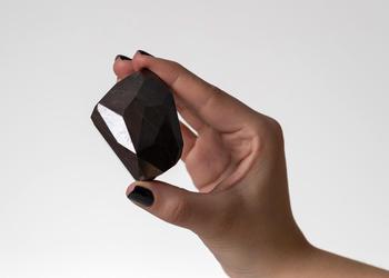 A unique black Enigma diamond weighing 555.55 carats was sold for $4,300,000 in cryptocurrency