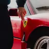 Front side view of Ferrari F40 in garage