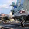 The British aircraft carrier HMS Queen Elizabeth, carrying fifth-generation F-35B Lightning II fighters, has transferred to NATO command for the first time in history-27