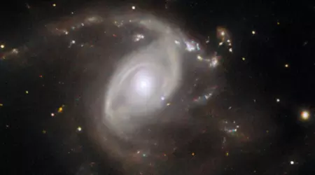 The Hubble telescope has captured a stunning photo of a bright supernova in a distant galaxy some 650 million light years away