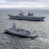 The British aircraft carrier HMS Queen Elizabeth, carrying fifth-generation F-35B Lightning II fighters, has transferred to NATO command for the first time in history-35