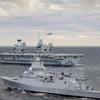 The British aircraft carrier HMS Queen Elizabeth, carrying fifth-generation F-35B Lightning II fighters, has transferred to NATO command for the first time in history-25