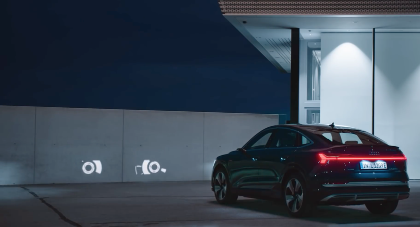 Audi представила умные фары Digital Matrix LED, которые могут проецировать анимированные изображения на дорогу и стену