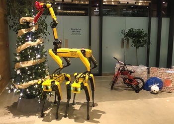 Boston Dynamics showed how three Spot robots decorate a Christmas tree