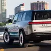Thumbnail of Rivian R1S Quad Miami Edition side view