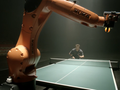 post_big/Tischtennisstar-Timo-Boll-im-Spiel-mit-einem-Kuka-Roboter.png