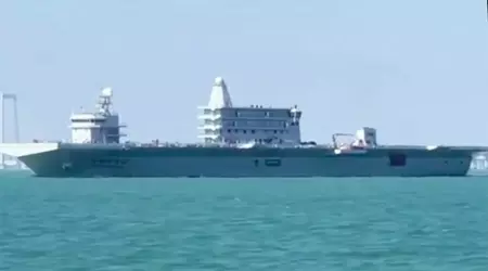 China launches previously unknown aircraft carrier with civilian markings
