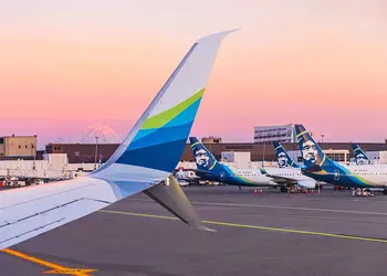 Alaska Airlines evacuated plane passengers after phone fire