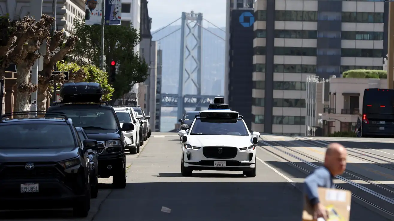 San Francisco prosecutor asks California authorities to suspend permits for Waymo and Cruise's 24-hour robot taxi service