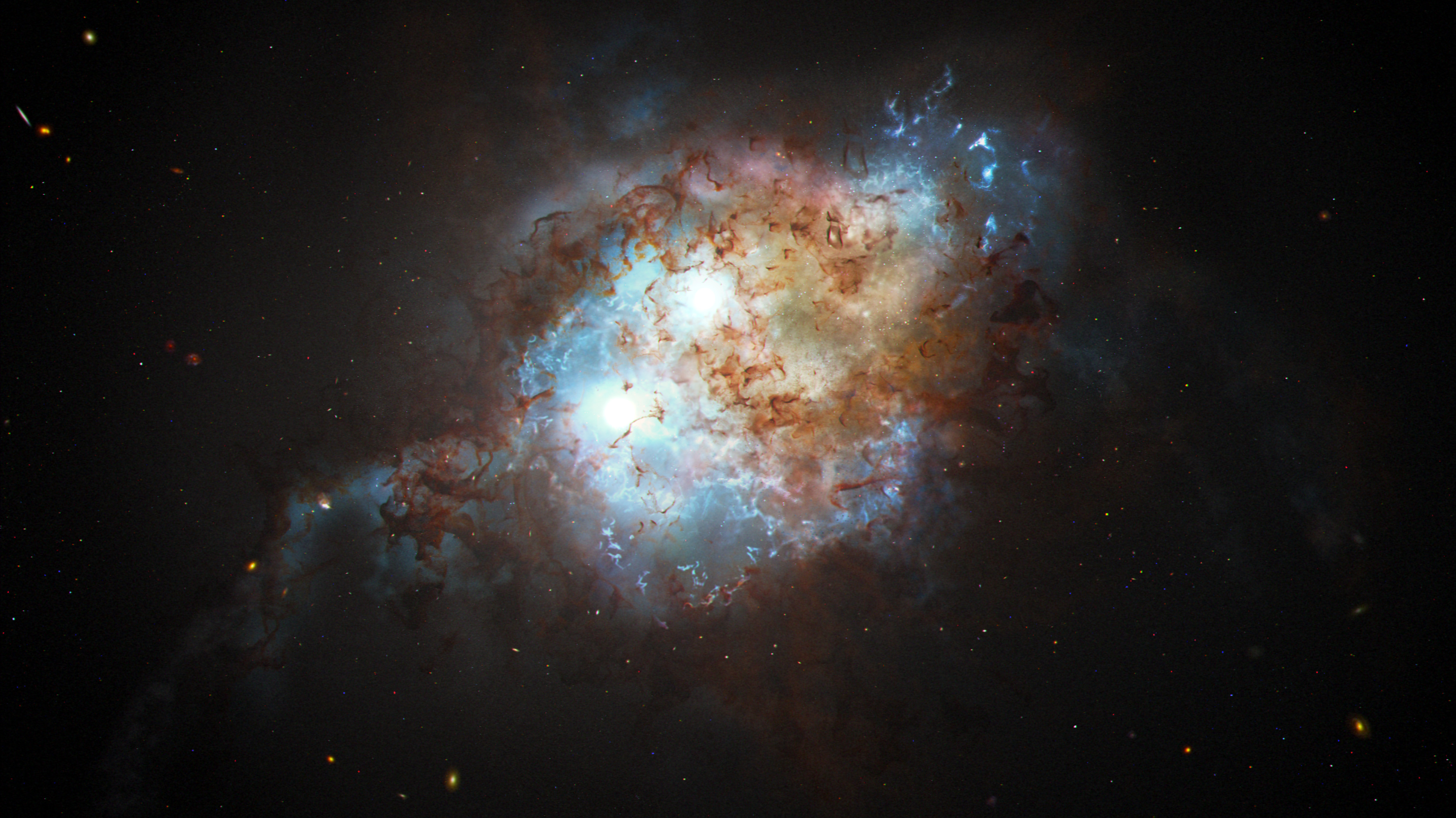 Hubble confirme la présence du premier quasar binaire à l'aube de l'Univers