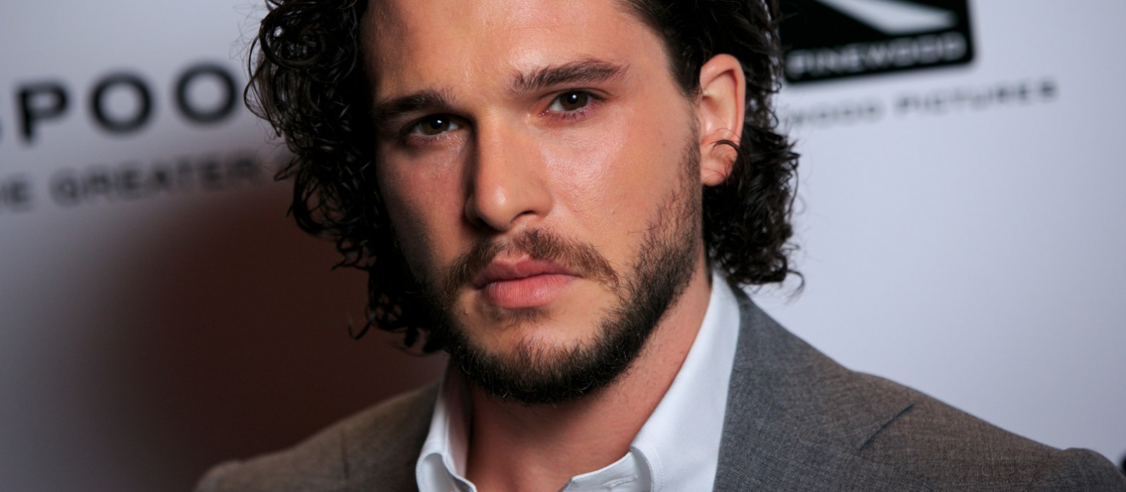 "Game of Thrones" star Kit Harington appeared as a mysterious lumberjack in the first shot of the new horror thriller "What Remains of Us"