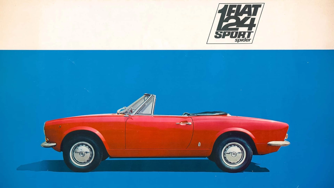 Класичний червоний Fiat 124 Sport Spider на дорозі