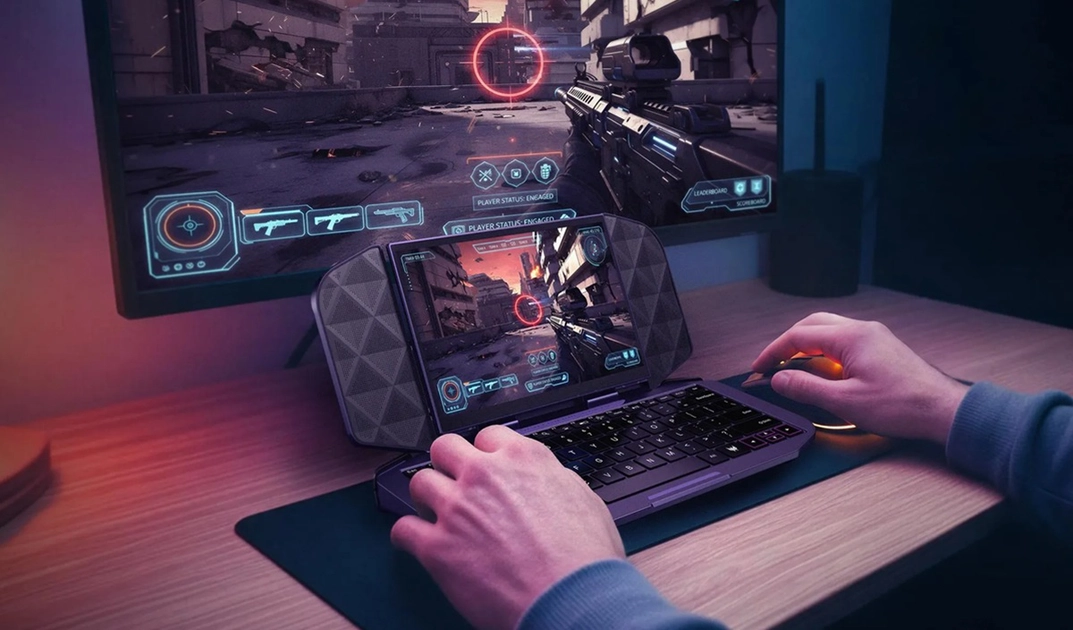 Project DualPlay Mini in laptop mode, with the backlit keyboard revealed and the display pivoted upward.