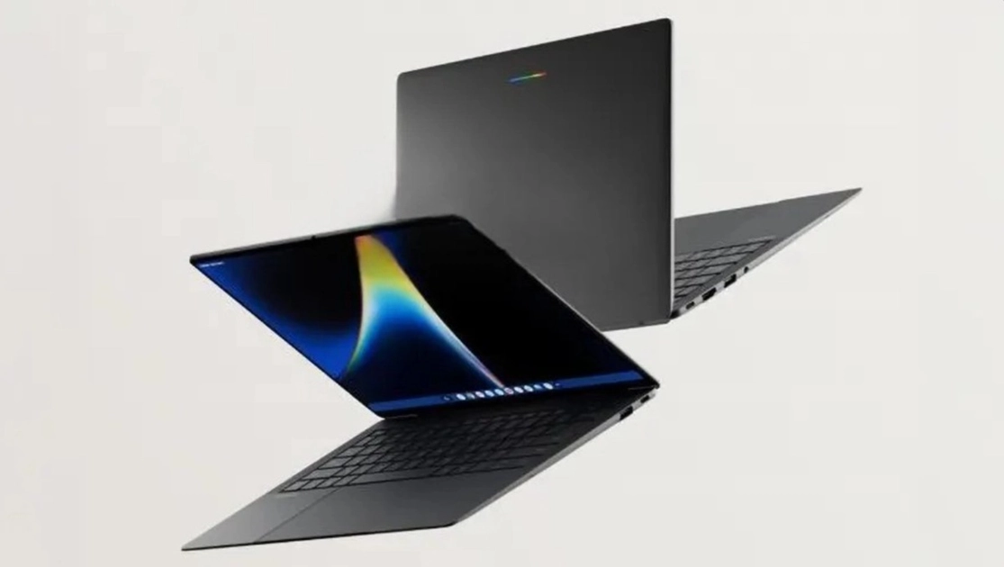 The ASUS Googlebook CX9406 workspace, showing the large trackpad, Google key, and Googlebook branding on the palm rest.