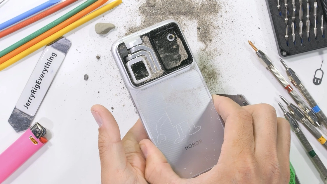 The Robot Phone's gimbal arm after sand exposure — compressed air couldn't restore function.