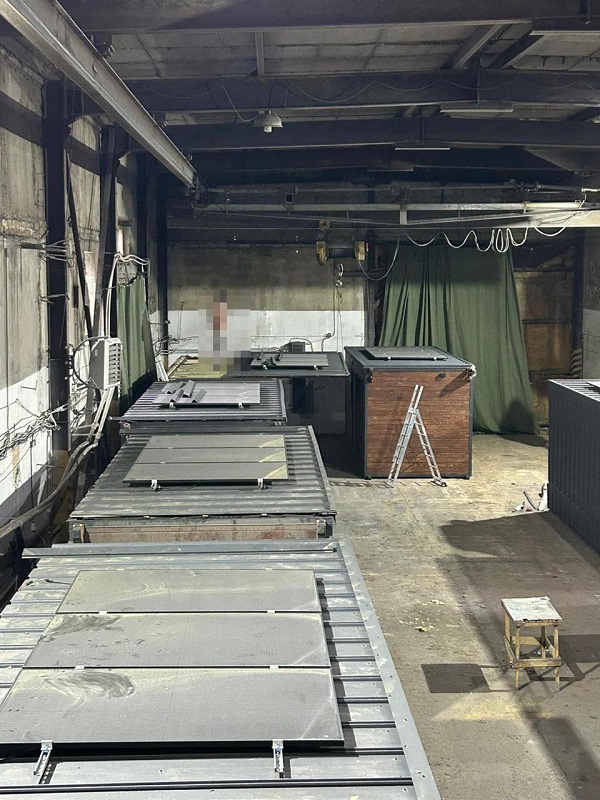 Drones hidden under the roofs of wooden huts