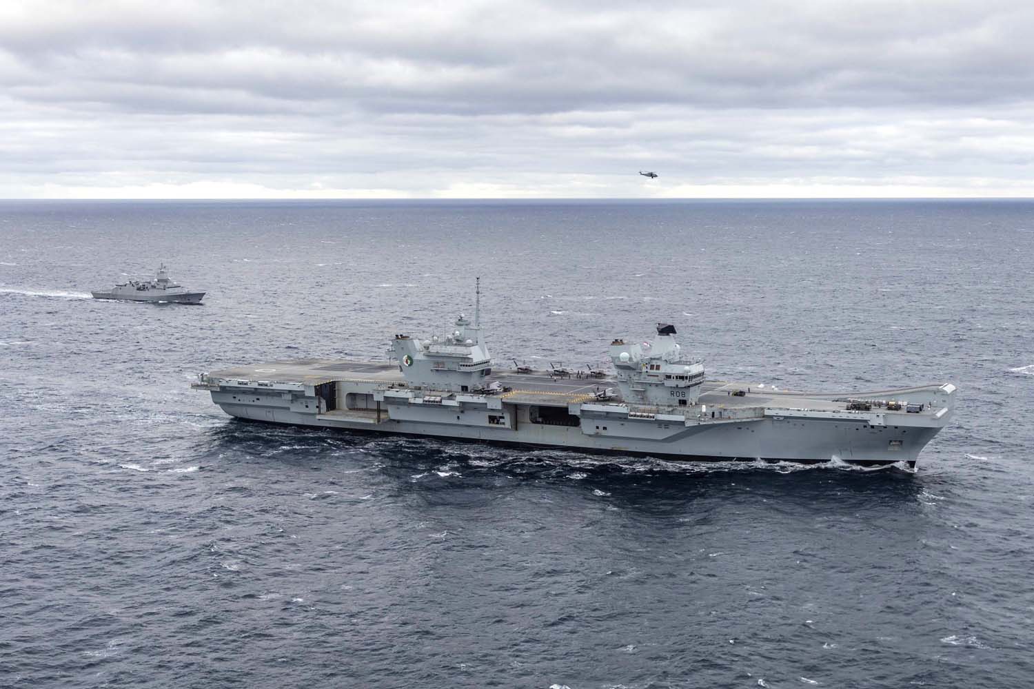 The British aircraft carrier HMS Queen Elizabeth, carrying fifth-generation F-35B Lightning II fighters, has transferred to NATO command for the first time in history-15