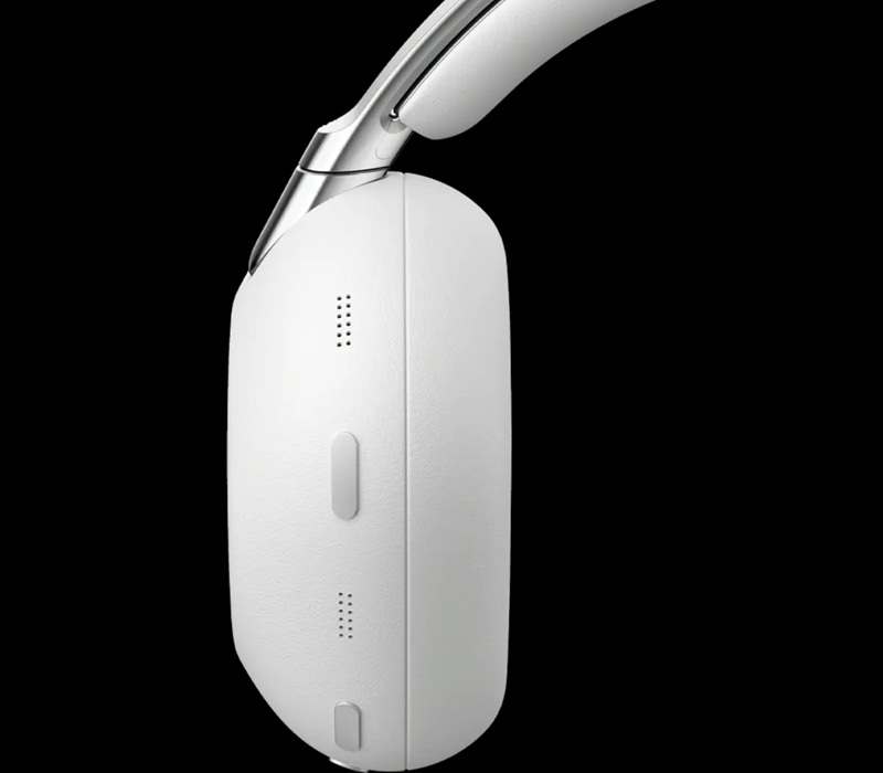 Touch controls are relocated to the side and rear edges of the ear cups, keeping the outer surface smooth