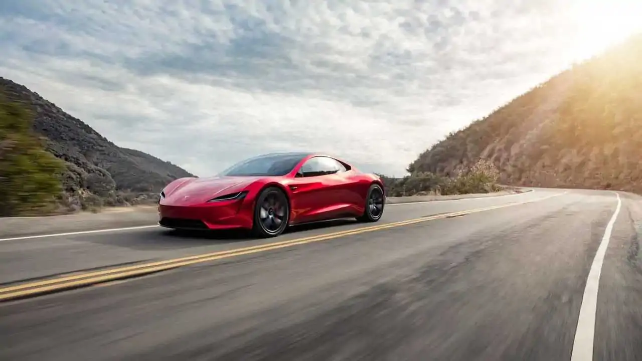 Tesla Roadster вид збоку