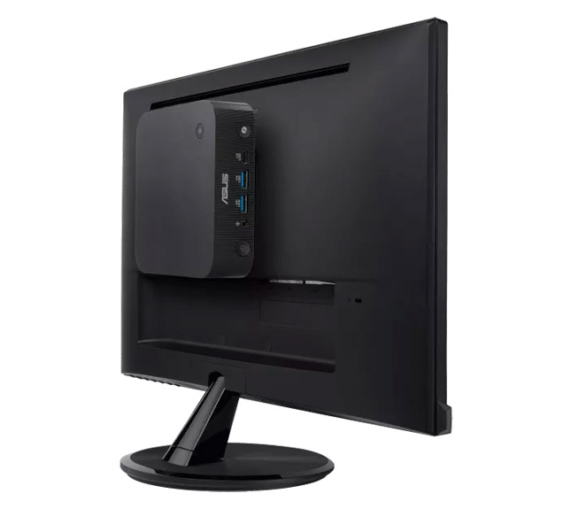 Photo Asus ExpertCenter PN55 Mini PC sur fond de bureau