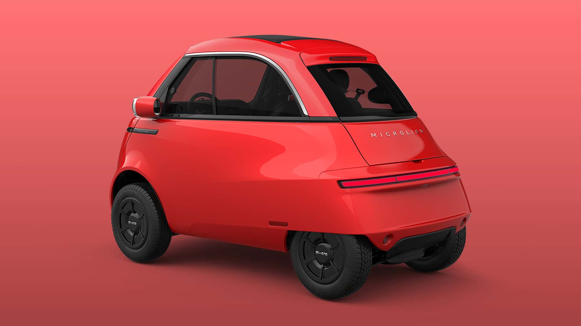 Microlino в червоному кольорі - боковий вигляд